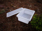 Stacked sensory bins with lids used for storage and sensory play activities