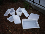 Clear sensory bin with loose fitting lid for storage and play activities