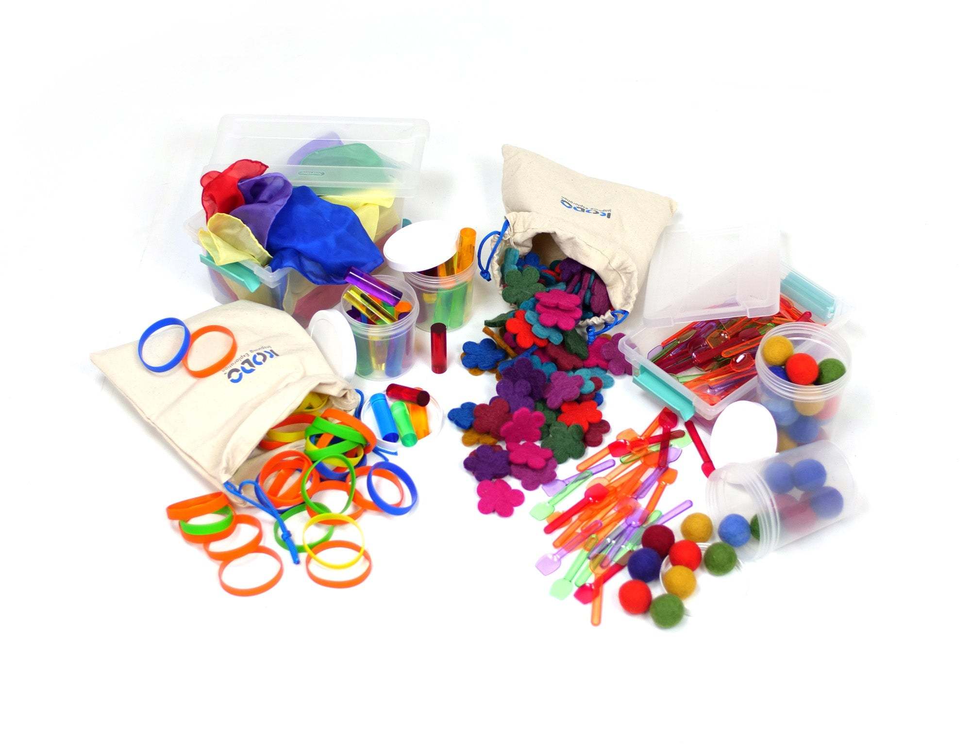Colorful Loose Parts Color Mix set with over 290 textured pieces including translucent pegs, play silks, and felted wool for creative play