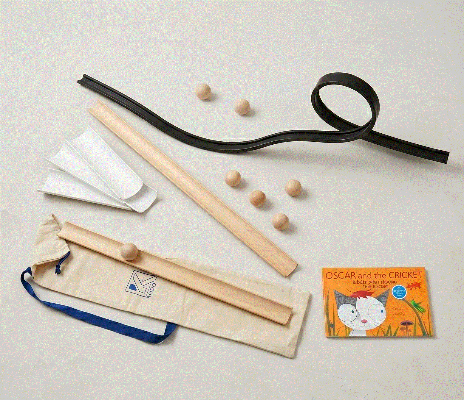Kodo STEM at Home Collection Ramp Exploration Kit with ramps, wooden balls, and activity guide for hands-on STEM learning
