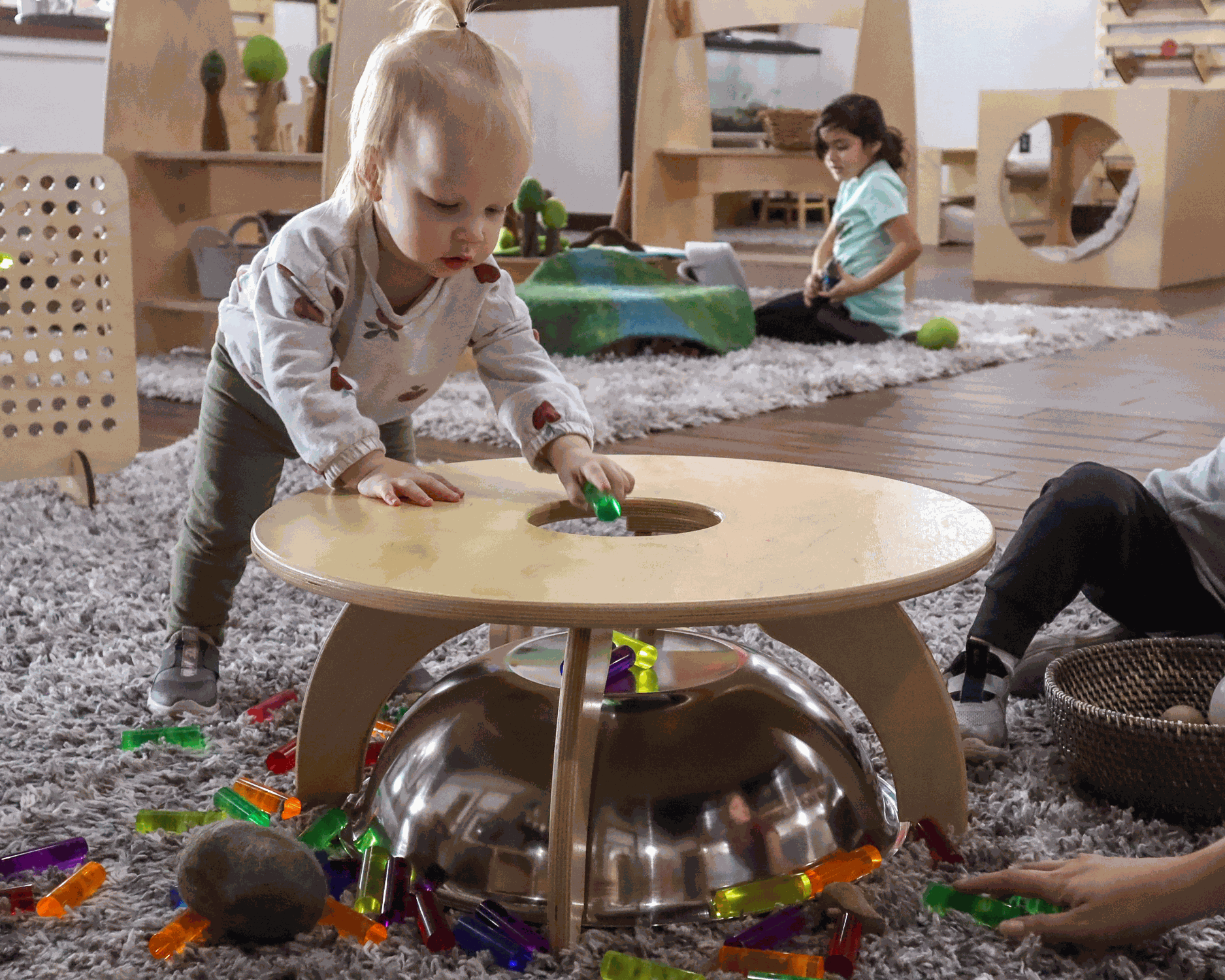 Toddler play table with removable bowl and reflective stainless steel insert for sensory exploration and dramatic play