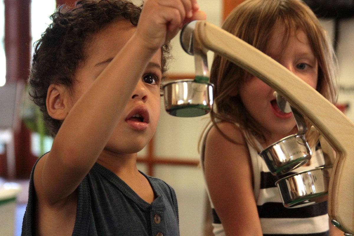Kodo's balance wooden educational toy demonstrating weight distribution and STEM concepts for children