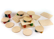Set of ten natural wood building boards and circular platforms supported by colorful wooden blocks on a white background.