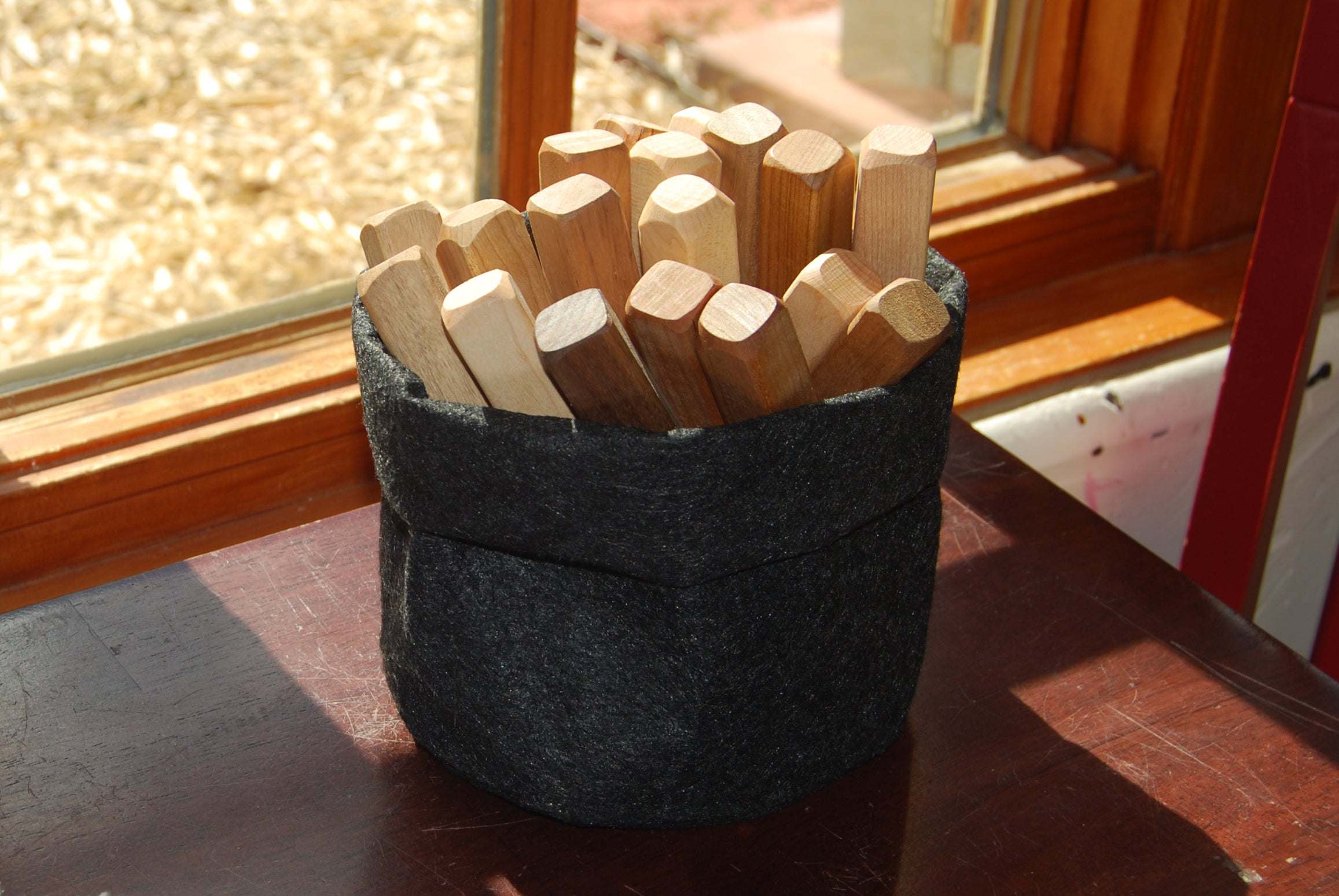 Set of 18 colorful building sticks for stacking and counting including cherry, maple, and walnut wood