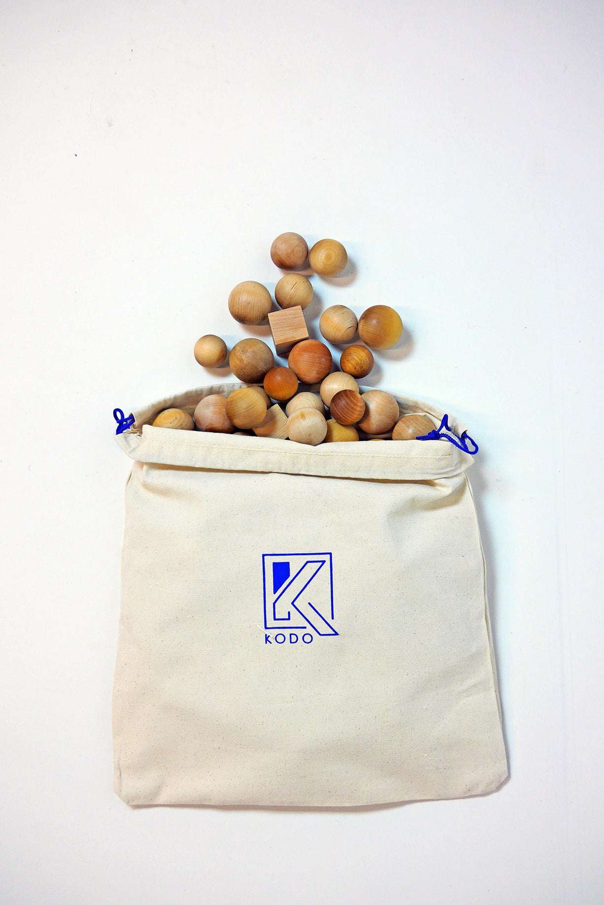 Canvas storage bags with drawstring closures in two sizes for organizing materials