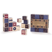 Uncle Goose wooden constellation blocks featuring navy, red, and natural wood sides with debossed and printed star charts.