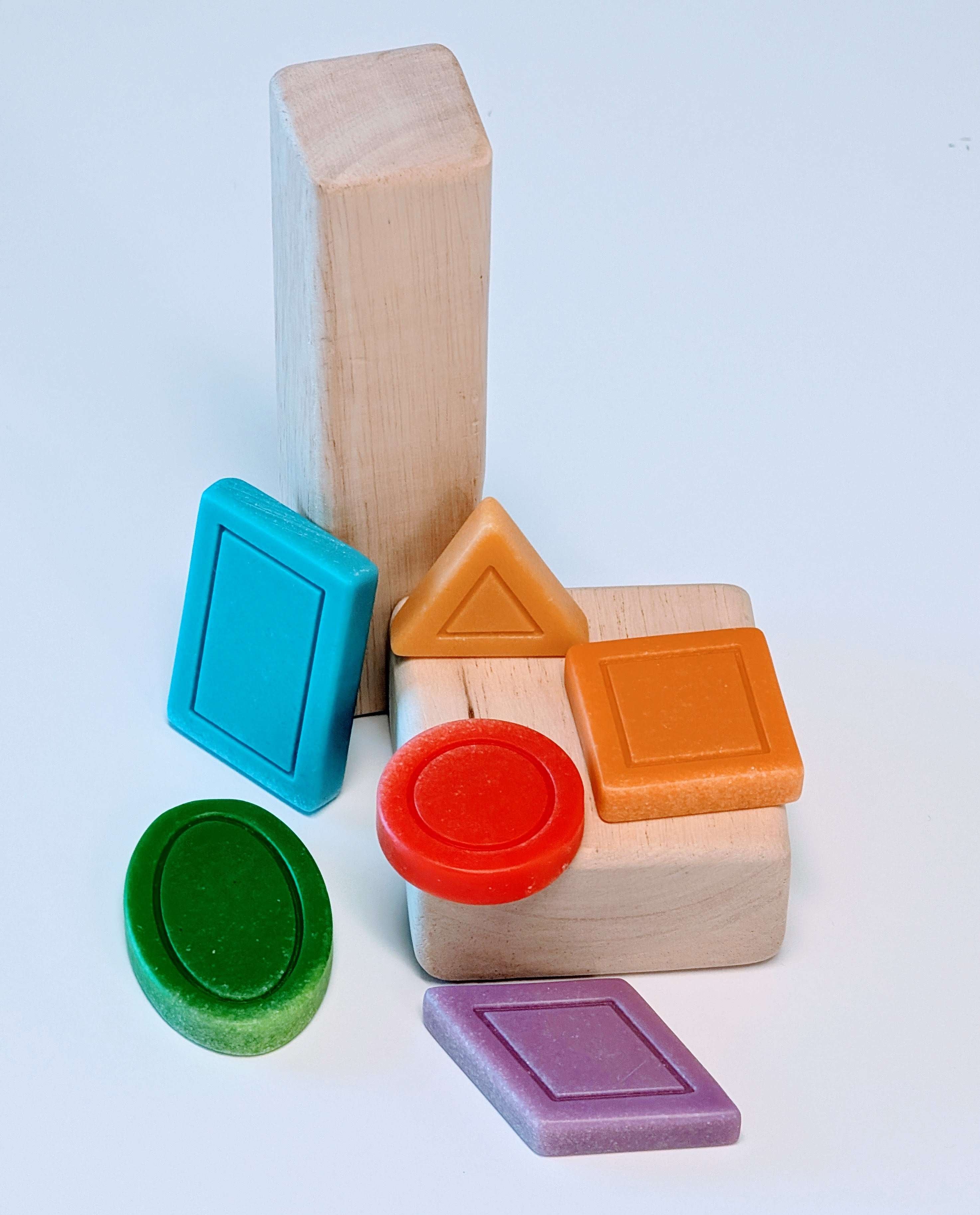 Set of colorful geometric patterning stones for math learning and sensory play