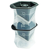 Two Tovolo hexagonal ice molds stacked together, featuring clear plastic bodies and black silicone lids.