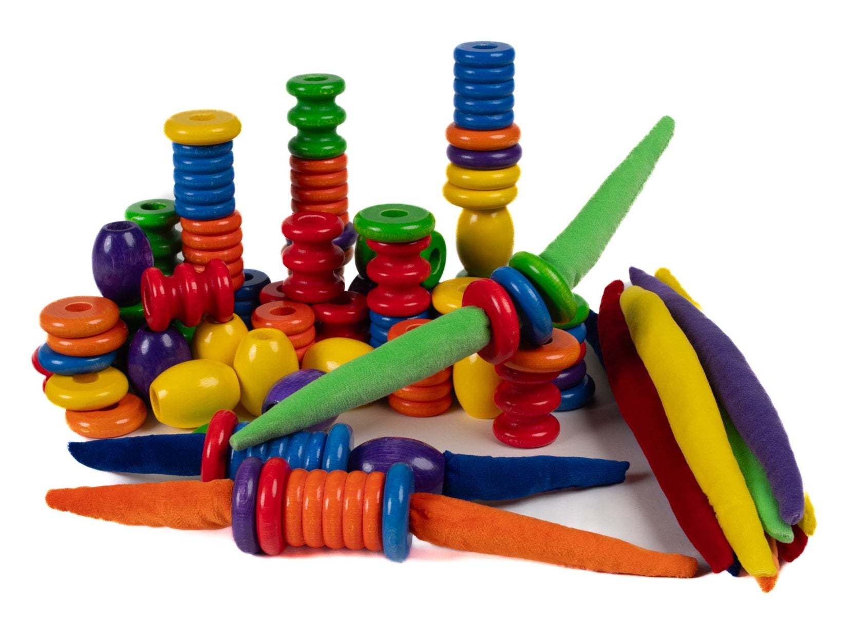 Colorful wooden stacking rings and felted fabric shapes for creative play, featuring a variety of bright primary colors.