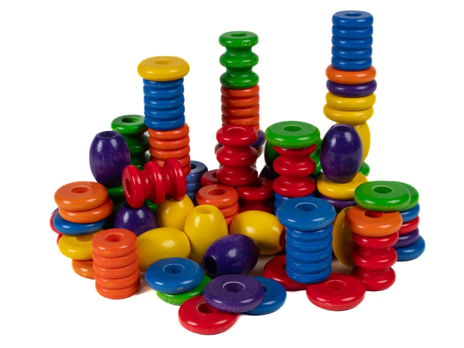 Assorted colorful wooden beads in various shapes and sizes stacked on a white background.