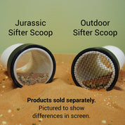 Jurassic Sifter Scoop with fine mesh next to an outdoor scoop with a larger grid screen, both resting in desert sand.