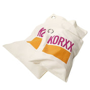 Off-white canvas storage bags for Korxx building blocks with orange stripes and purple Korxx branding.