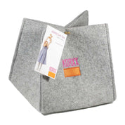 Grey felt storage basket for Korxx cork building blocks with a branded orange patch and product tag.