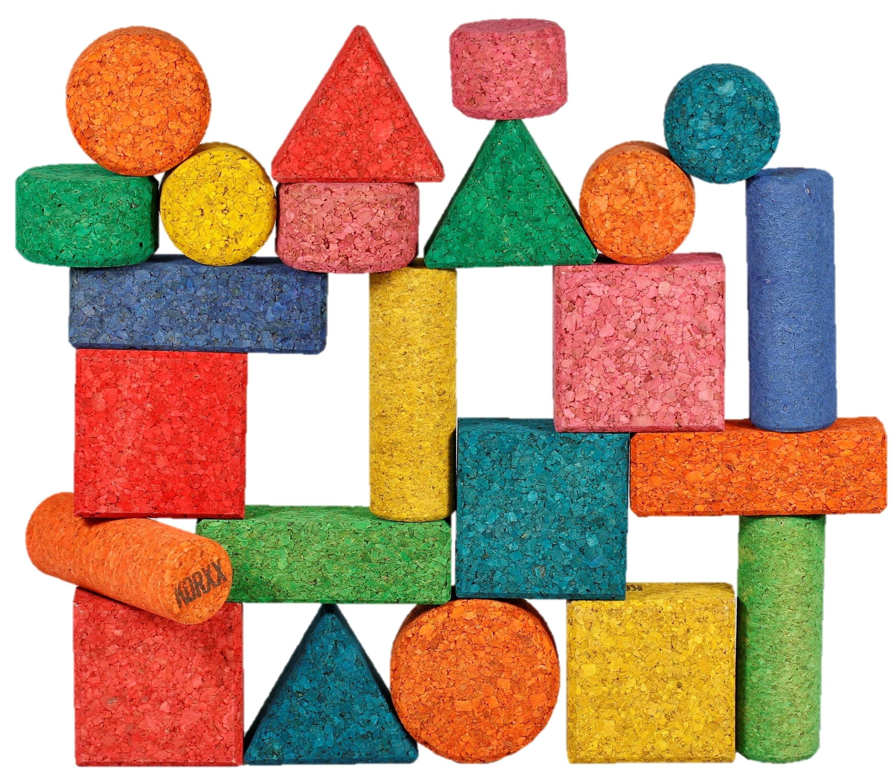 Set of 56 vibrant, geometric cork building blocks in various shapes and colors for creative, stable play.