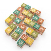 Set of vintage-style wooden alphabet blocks with colorful embossed letters and decorative patterns on a white background.