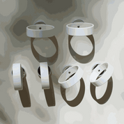 Set of six white circular magnetic rings for wall mounting, featuring a minimalist design for supporting play materials.