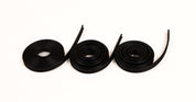 Three coils of flexible black rubber track for building STEM marble runs on a white background.