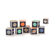 Planet Blocks educational toy set with planet symbols, names, moons, illustrations, and measurements for children and science teachers