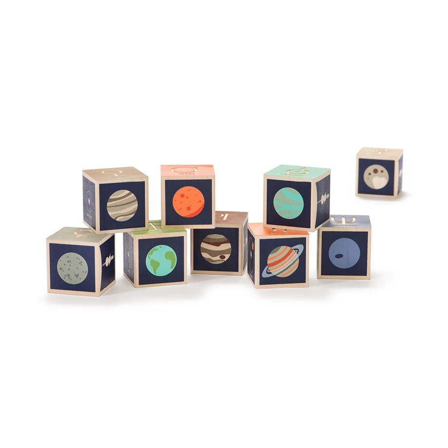 Planet Blocks educational toy set with planet symbols, names, moons, illustrations, and measurements for children and science teachers