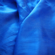 Colorful Mini Playsilks used as costumes and dance props for open-ended children's play