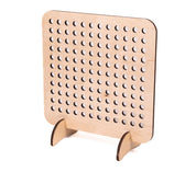 Upright birch wood pegboard with a grid of circular holes for sensory play and pattern making on a white background.