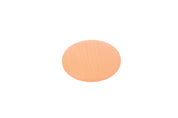 Smooth, round wooden disc in a soft pastel peach color with visible natural wood grain texture.