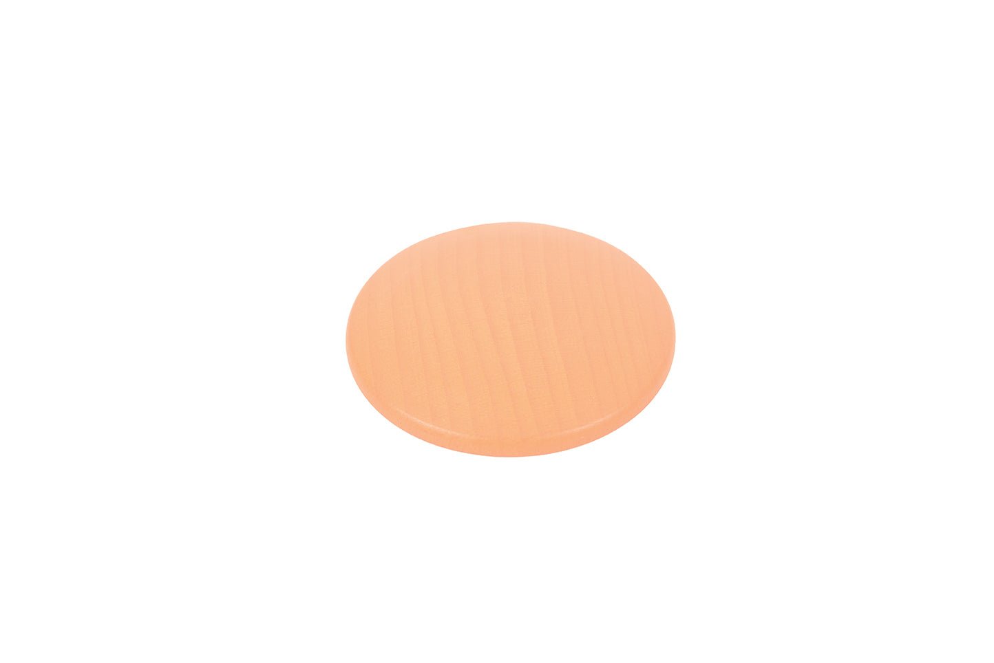 Smooth, round wooden disc in a soft pastel peach color with visible natural wood grain texture.