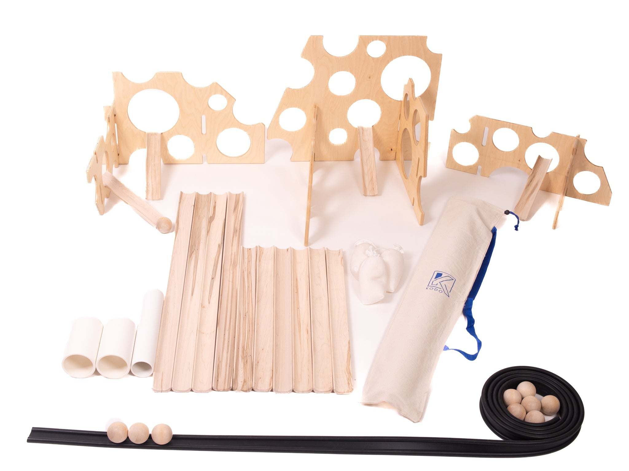 Wooden ramp center kit with natural wood tracks, Swiss stands, white tubes, balls, and a storage bag on a white background.