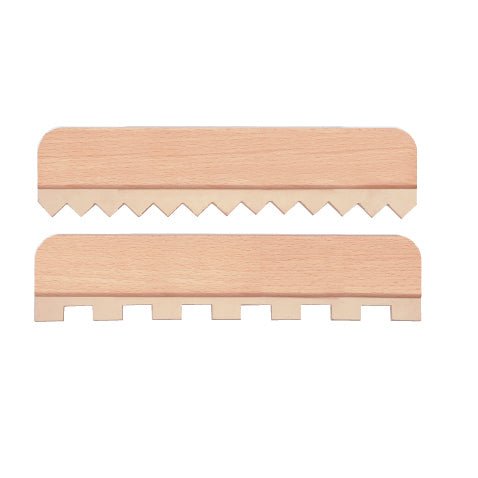 Two light-colored wooden sand rakes with different comb designs for creating patterns in sand.