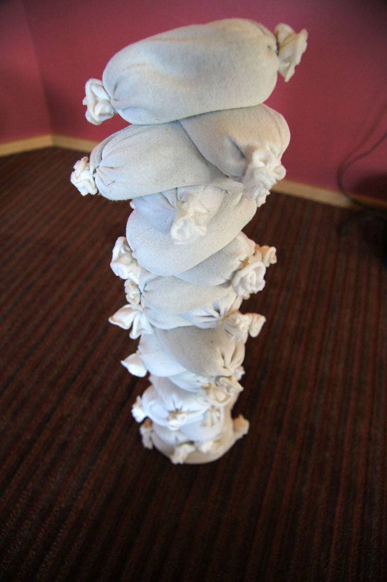 Children building creative structures with flexible sandbags in a classroom setting