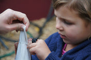 Children playing and building with flexible sandbags in a classroom setting