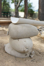 Children playing and building with flexible sandbags for creative construction and spatial awareness development