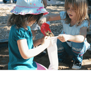 Flexible white sandbags filled by children for imaginative play and construction learning