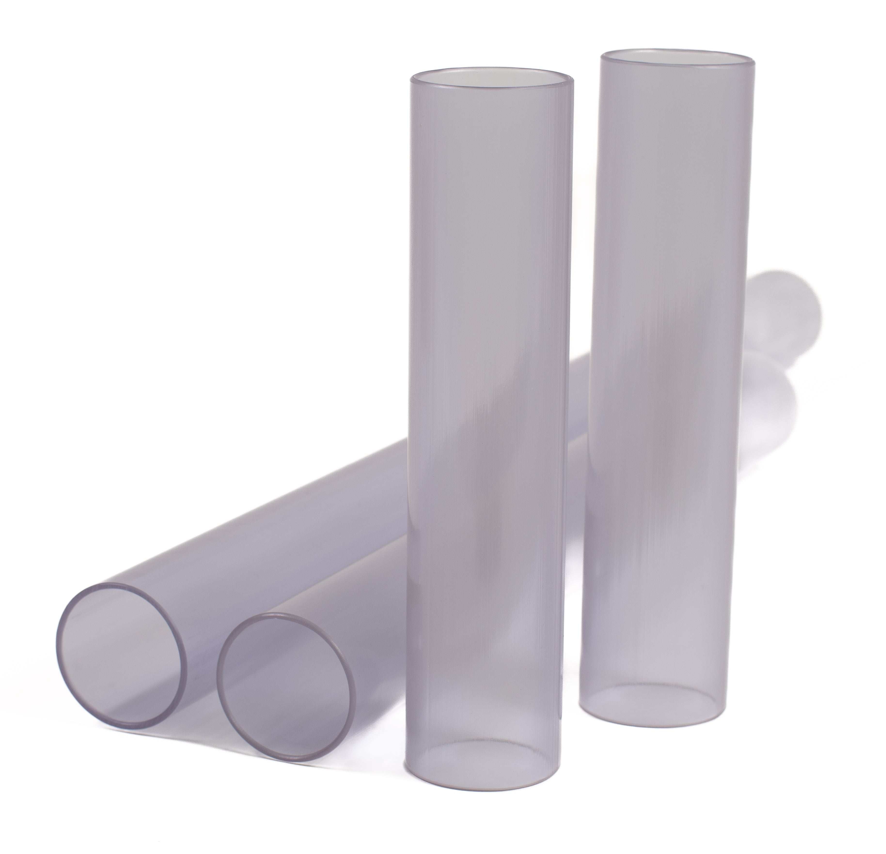 Set of four durable, translucent gray pipes for STEM water and sand play, standing upright and lying flat on white.