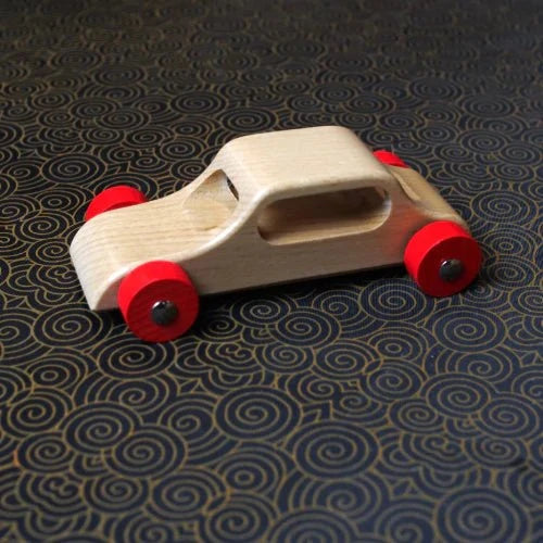 Set of handcrafted wooden cars made from solid hardwood with steel axles and natural lacquer finish