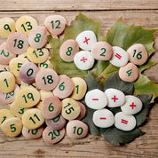 Number Pebbles educational set with hand-painted numerals and symbols for counting and math activities