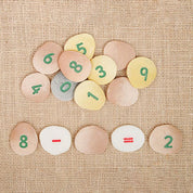 Colorful durable number pebbles with numerals and symbols for educational math play