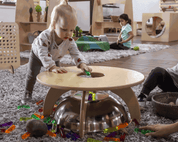 Toddler play table with removable bowl and reflective stainless steel insert for sensory exploration and dramatic play