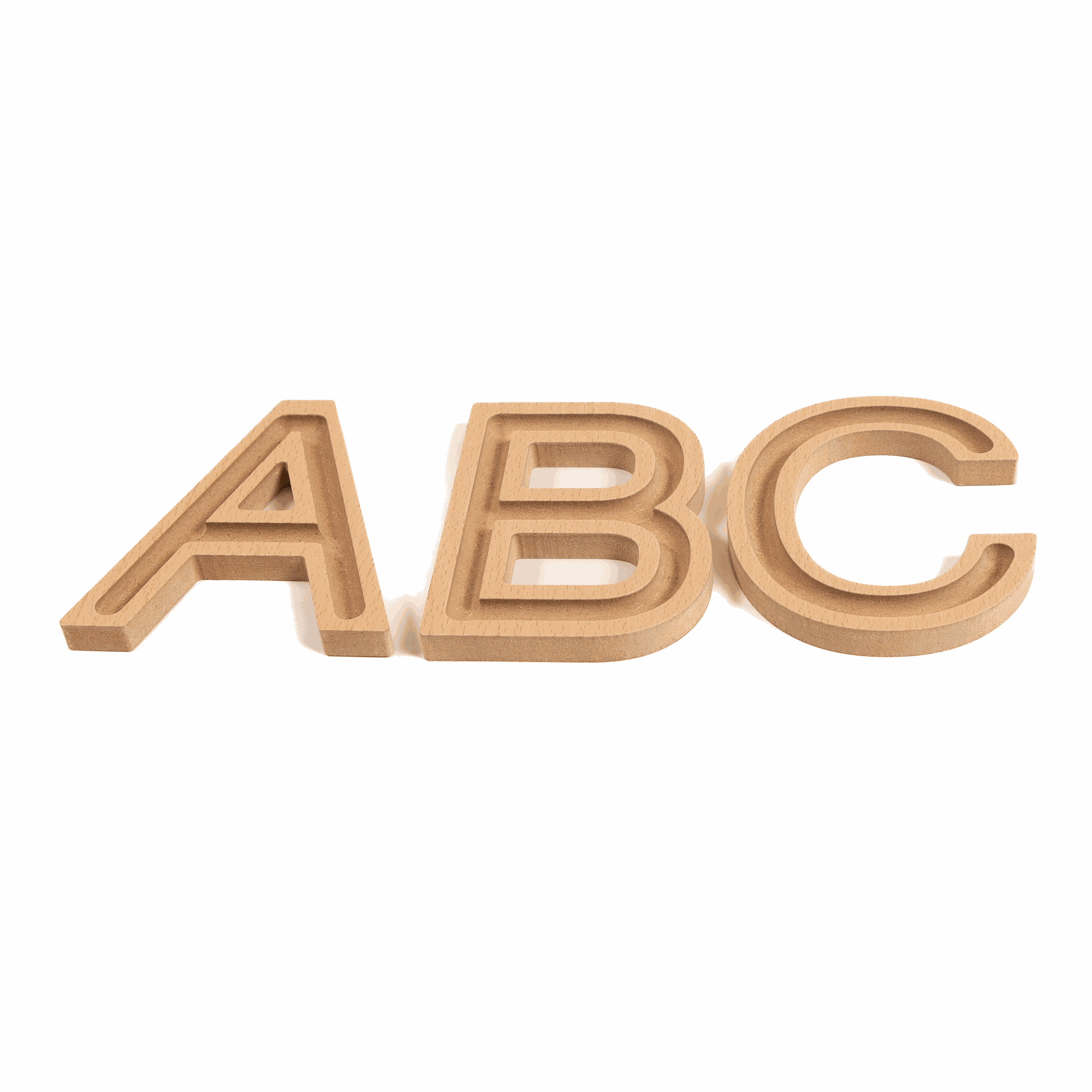 Three light-colored wooden uppercase letters A, B, and C with recessed grooves for tactile sensory learning.
