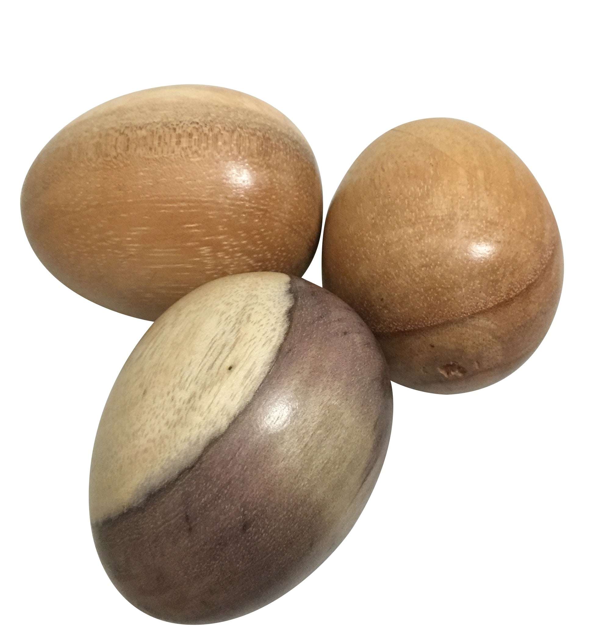 Three smooth, handcrafted wooden eggs featuring natural brown and purple wood grain patterns against a white background.